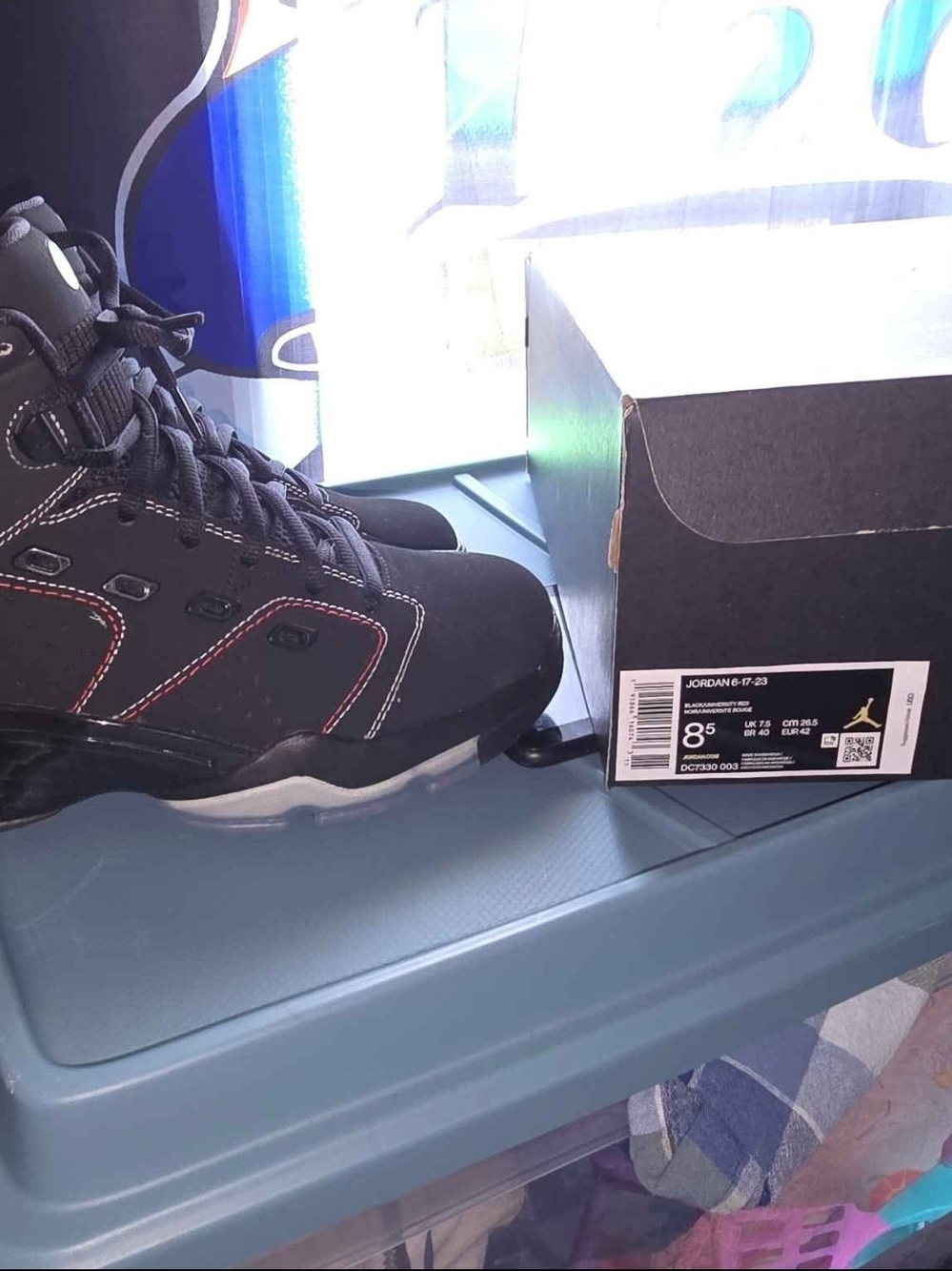 Jordan Men’s Black Sneaker with Red Stitching